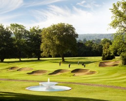 Group of golfers putting on hole 3 at Addington Palace Golf Club