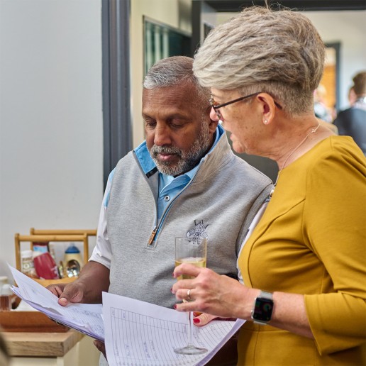 Addington Golf Club members in discussion at an event in the clubhouse