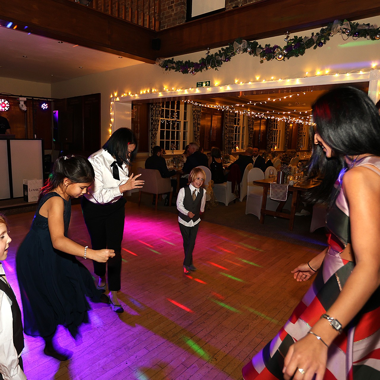 Wedding reception guests on the dance floor at Addington Palace Golf Club